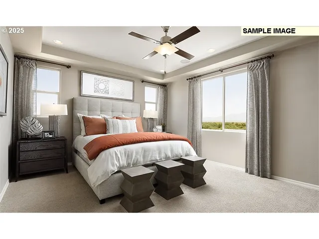 a bed room with a bed and a window