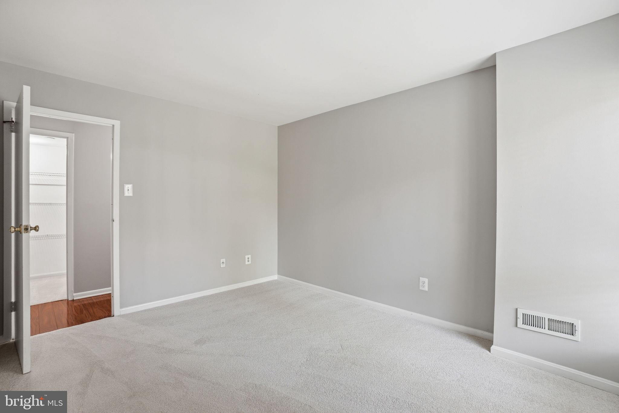 11228 Chestnut Grove Square, Unit 132 Reston, VA 20190 - Photo 16 of 25 Spacious, light-filled room awaits you.