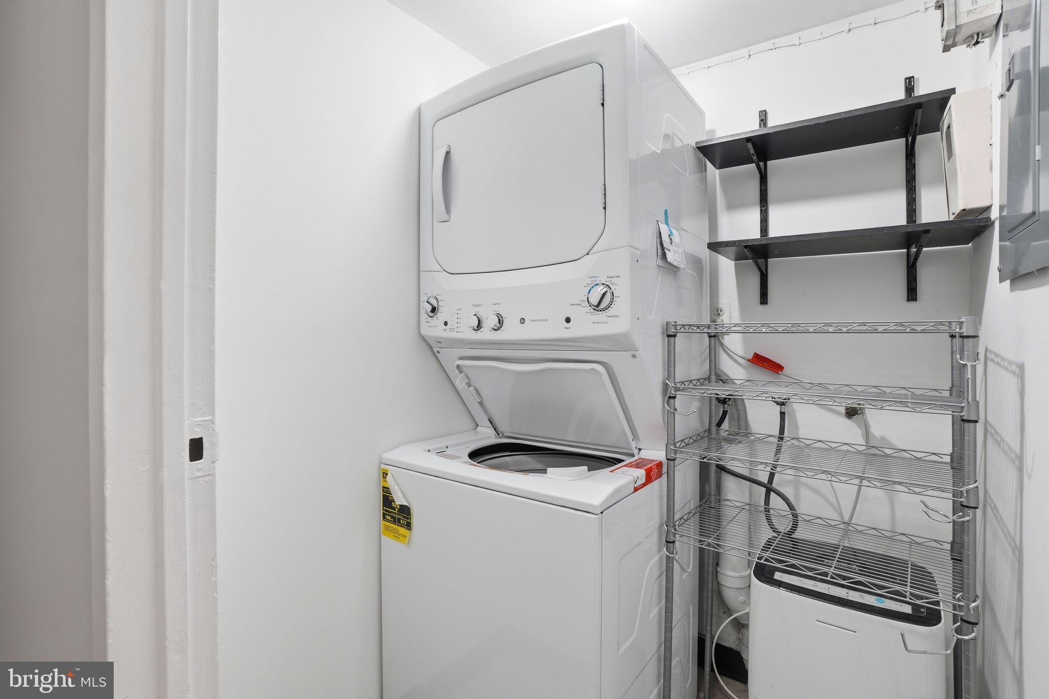 11228 Chestnut Grove Square, Unit 132 Reston, VA 20190 - Photo 17 of 25 Efficient laundry space in modern design.
