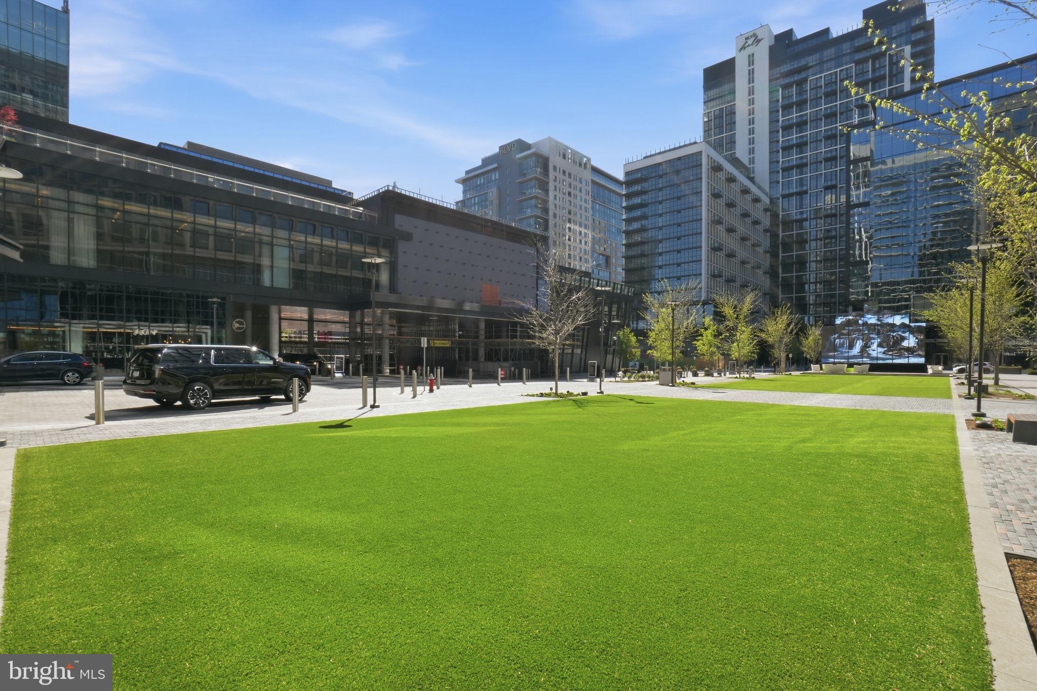 11228 Chestnut Grove Square, Unit 132 Reston, VA 20190 - Photo 23 of 25 Urban oasis amidst modern architecture.