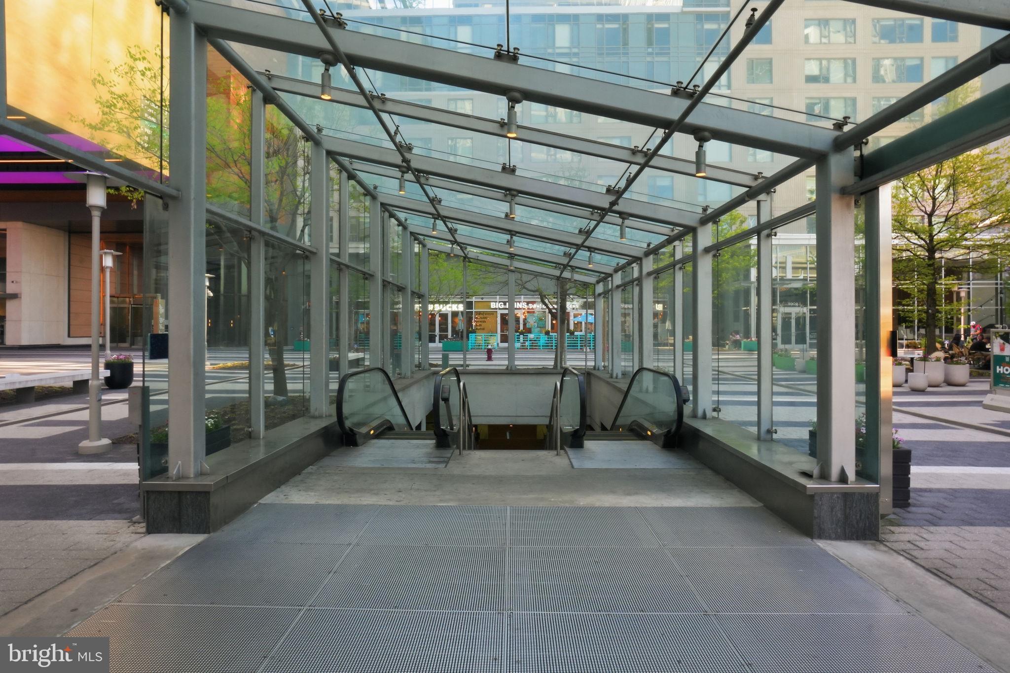 11228 Chestnut Grove Square, Unit 132 Reston, VA 20190 - Photo 25 of 25 Modern transit hub entrance