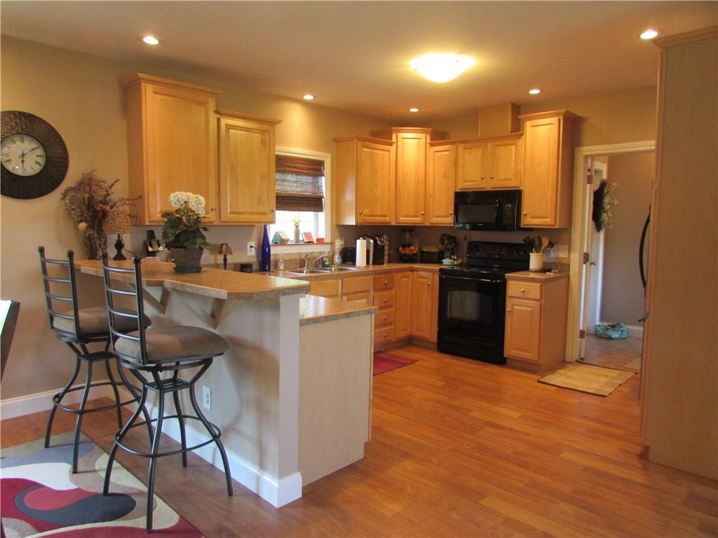 1219 Shaw Road Volant, PA 16156 - Photo 6 of 18 Kitchen with breakfast bar
