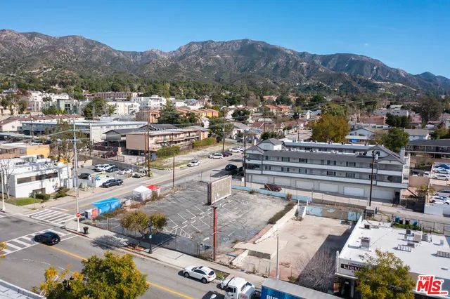 an aerial view of a yard with seating space