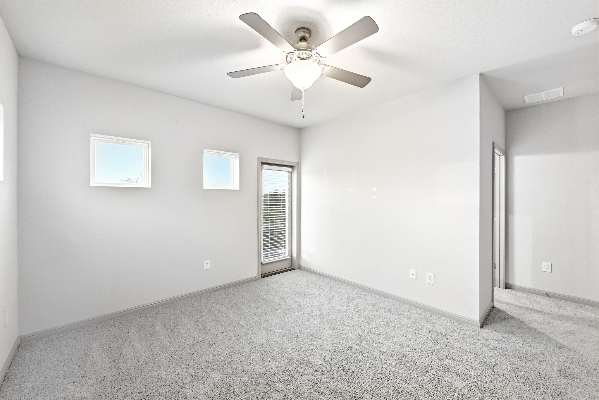 5517 Charles Merle Dr., Unit B Austin, TX 78747 - Photo 8 of 25 a view of an empty room with a window