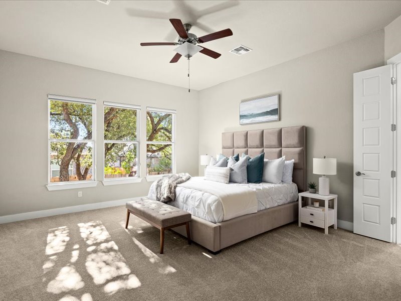 227 Bridge Water Loop Dripping Springs, TX 78620 - Photo 19 of 40 a bed room with a bed and a window