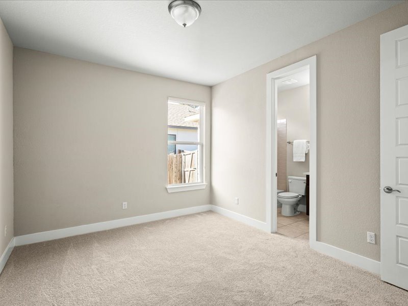 227 Bridge Water Loop Dripping Springs, TX 78620 - Photo 26 of 40 an empty room with windows and closet