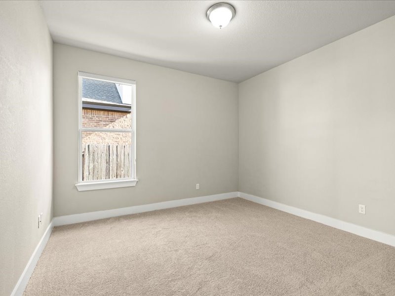 227 Bridge Water Loop Dripping Springs, TX 78620 - Photo 28 of 40 an empty room with a window