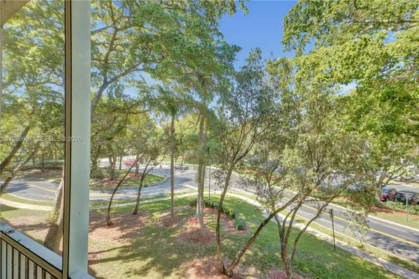 a view of yard from balcony