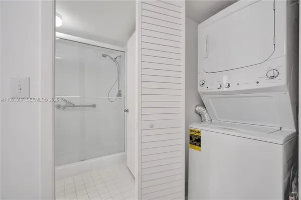 a bathroom with a washer and dryer