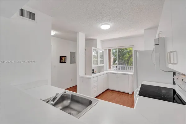 a room with furniture and a window