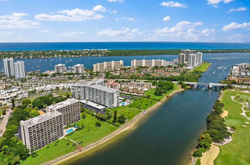 336 Golfview Road, Unit 311 North Palm Beach, FL 33408 - Photo 2 of 62 a view of a city and a lake view