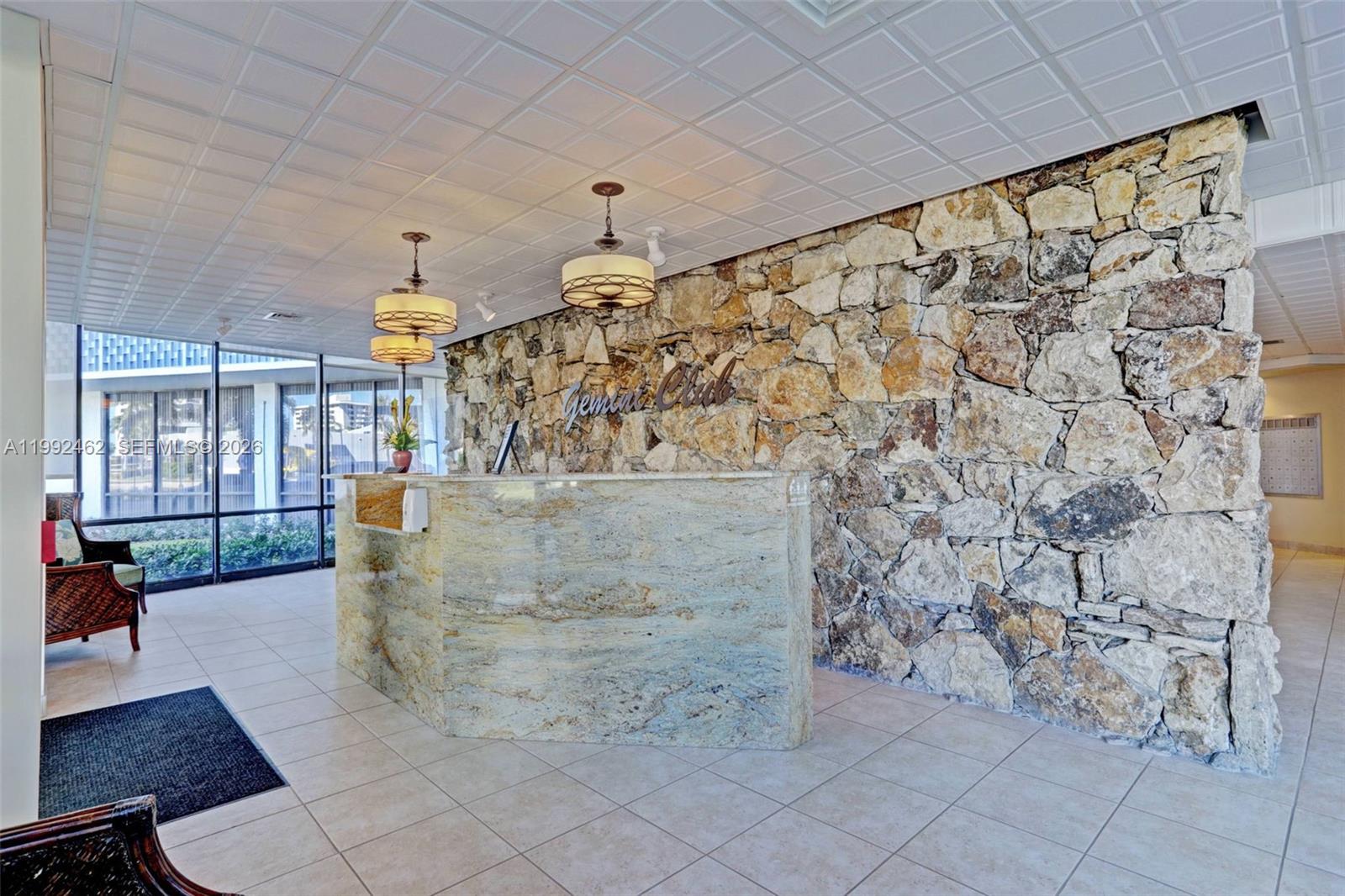 336 Golfview Road, Unit 311 North Palm Beach, FL 33408 - Photo 41 of 62 a view of entryway with kitchen