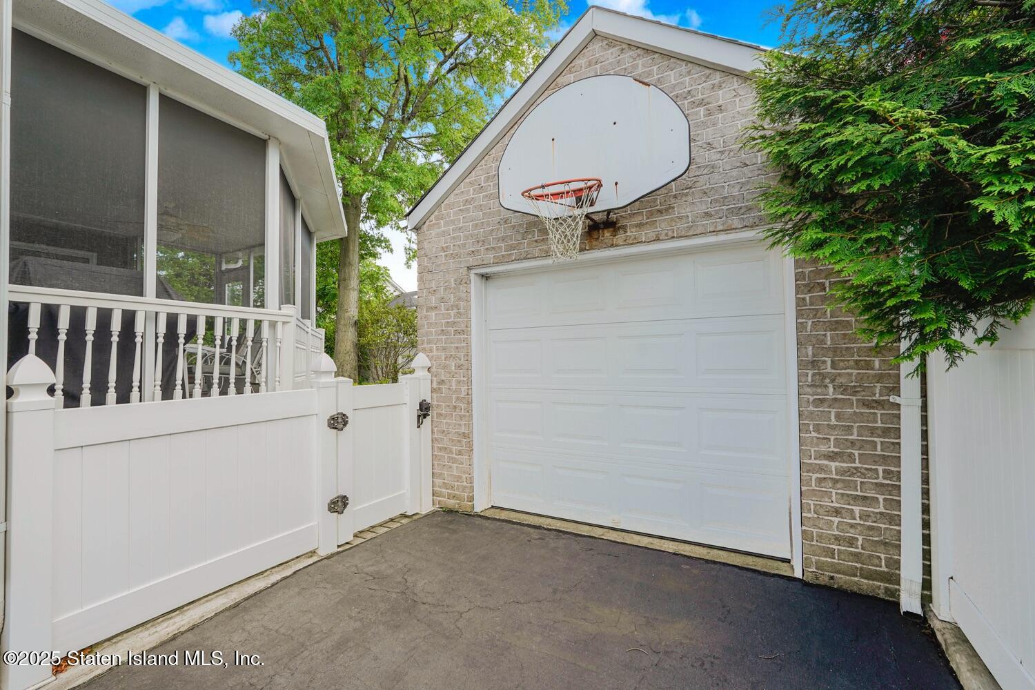 312 Barbara Street Staten Island, NY 10306 - Photo 31 of 34 an outdoor view of garden with trees