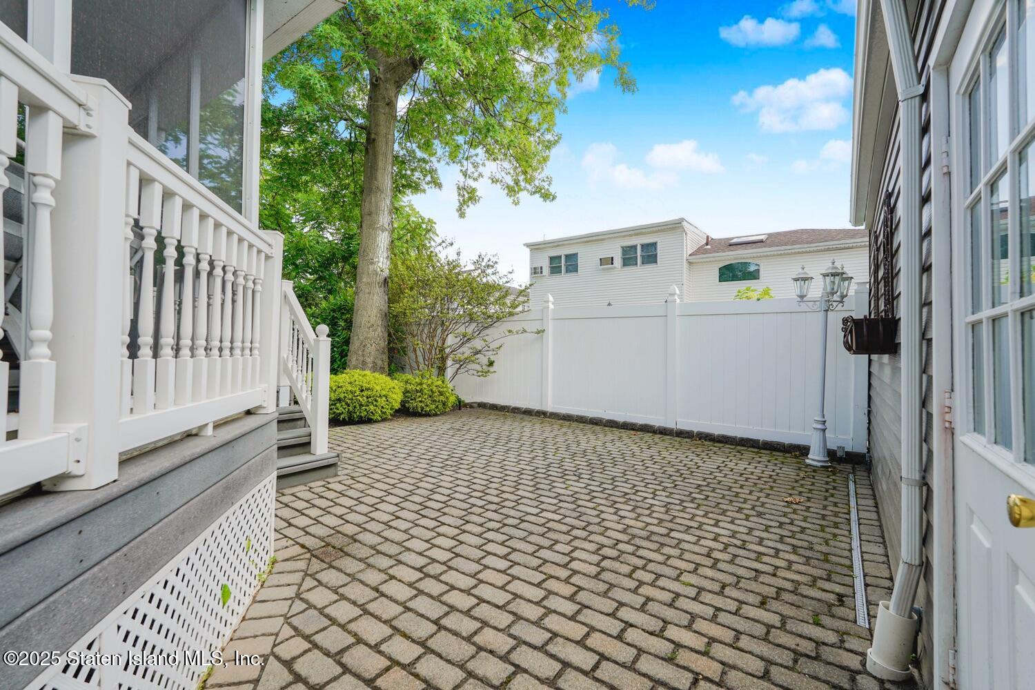 312 Barbara Street Staten Island, NY 10306 - Photo 32 of 34 a view of a house with a white door