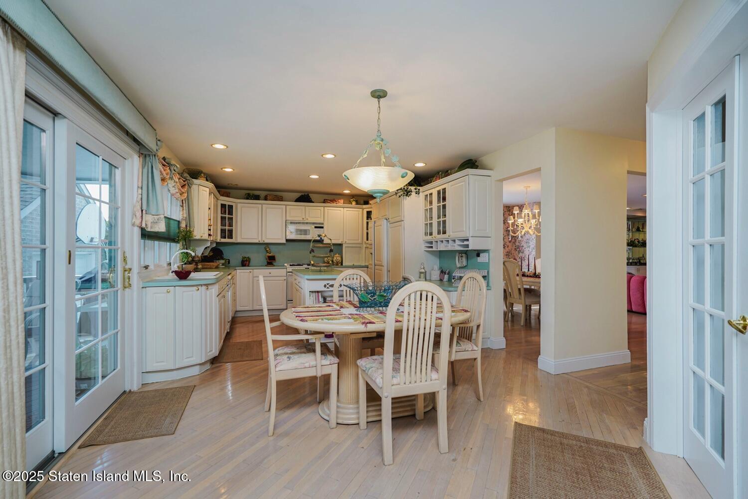312 Barbara Street Staten Island, NY 10306 - Photo 9 of 34 a dining room with a table and chairs