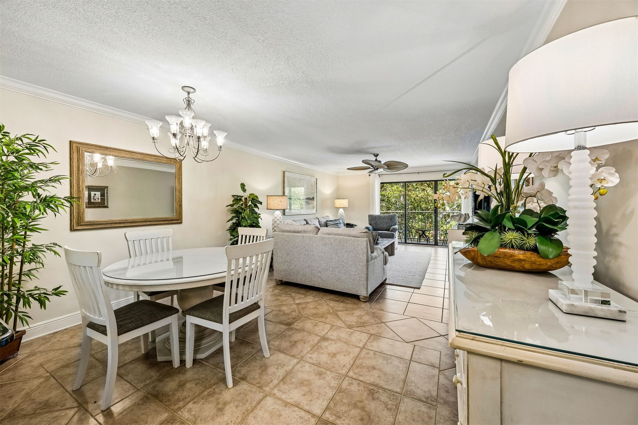 2117 Beachwood Road, Unit 2117 Fernandina Beach, FL 32034 - Photo 7 of 36 a dining room with furniture and a chandelier