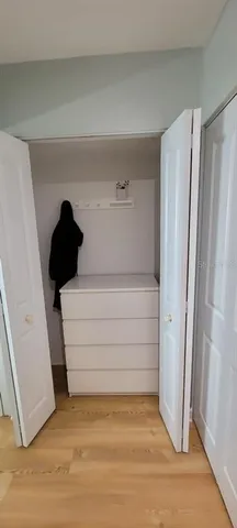 a view of storage and utility room with washer and dryer