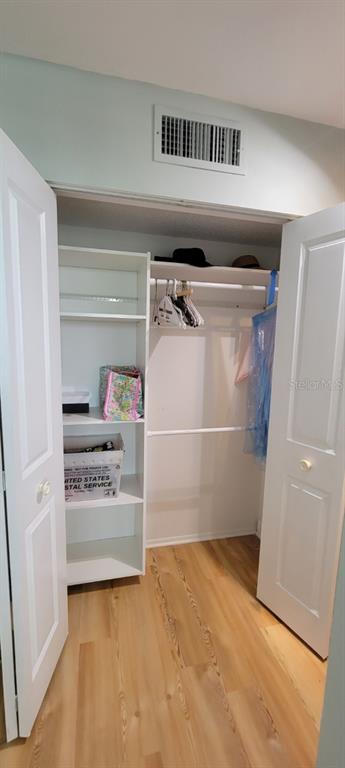 632 Edgewater Drive, Unit 537 Dunedin, FL 34698 - Photo 25 of 28 a view of storage and utility room with washer and dryer