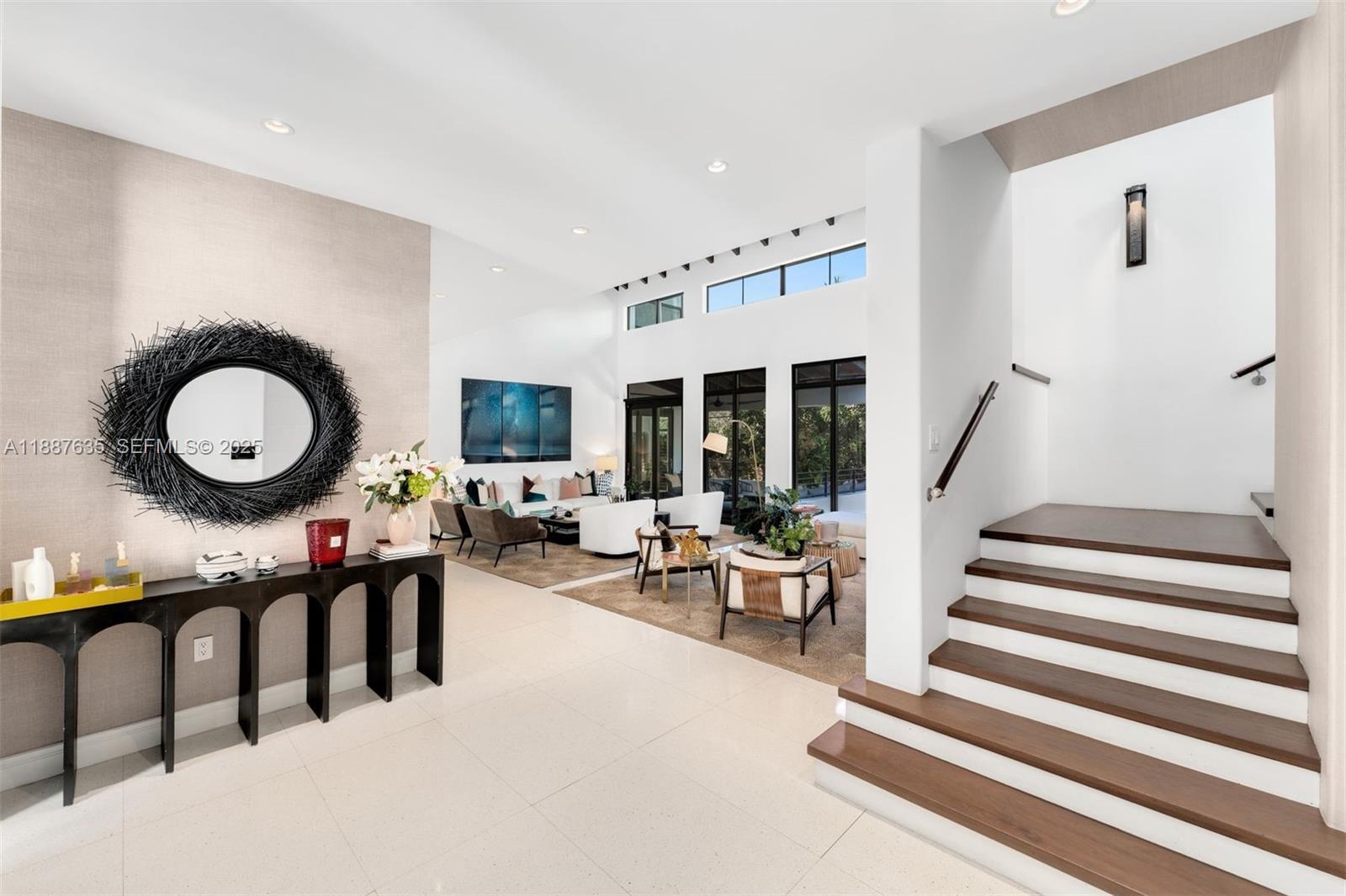 330 Caribbean Road Key Biscayne, FL 33149 - Photo 18 of 46 a living room with furniture and a large window