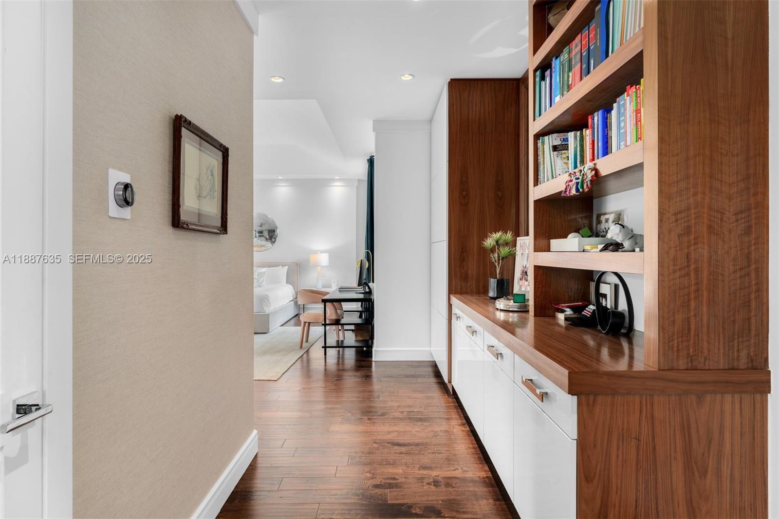 330 Caribbean Road Key Biscayne, FL 33149 - Photo 21 of 46 a hallway with cabinets and wooden floor