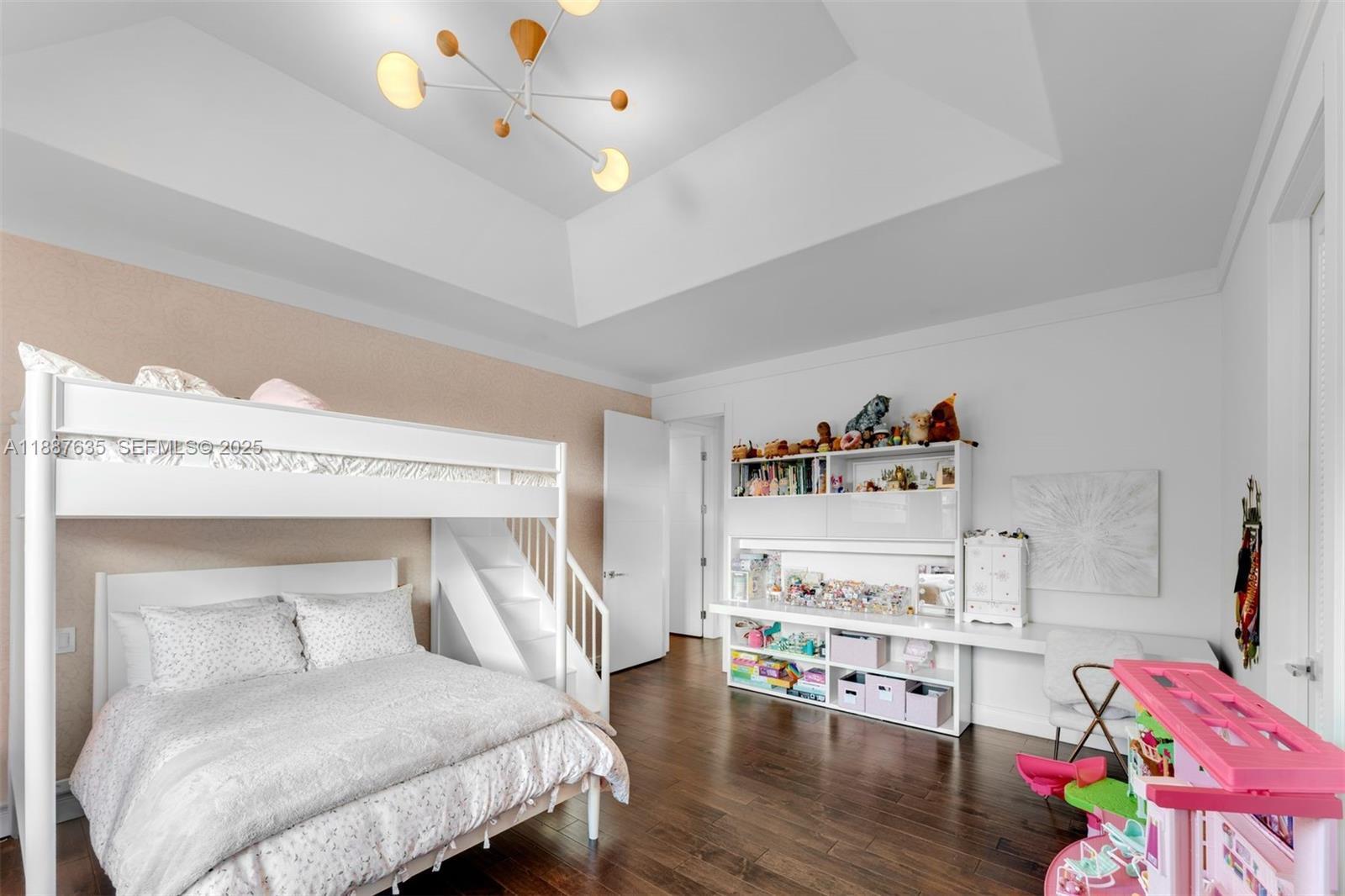 330 Caribbean Road Key Biscayne, FL 33149 - Photo 29 of 46 a bedroom with a bed and furniture