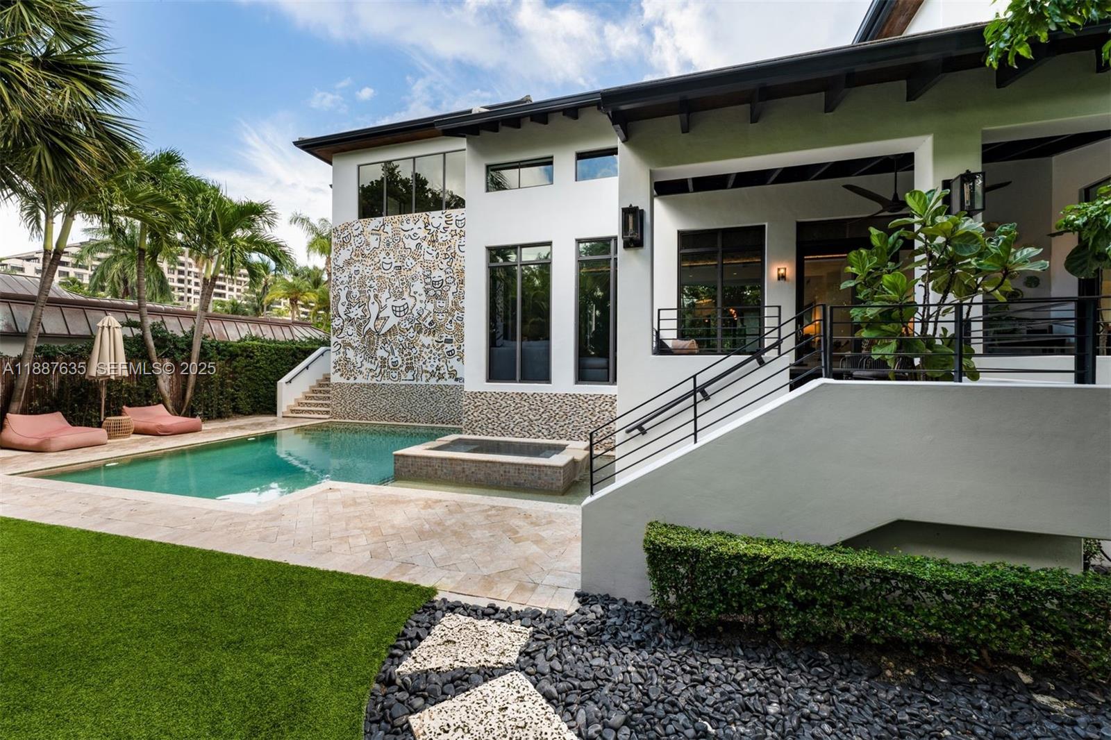 330 Caribbean Road Key Biscayne, FL 33149 - Photo 36 of 46 a view of a house with a yard