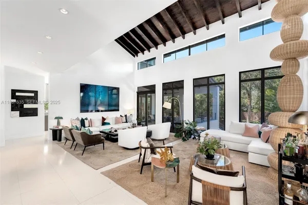 a living room with furniture or couch and a flat screen tv