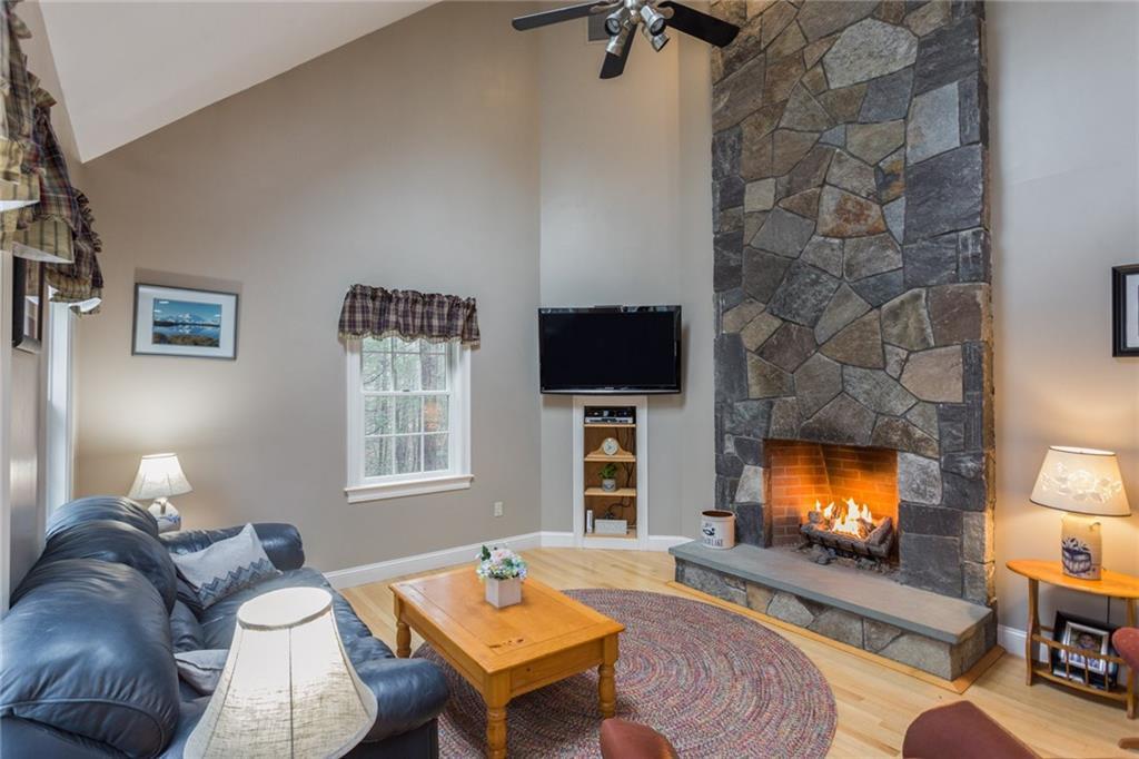 23 Lynch Lane Kittery Point, ME 03905 - Photo 11 of 34 Built-ins, fieldstone gas fireplace,...