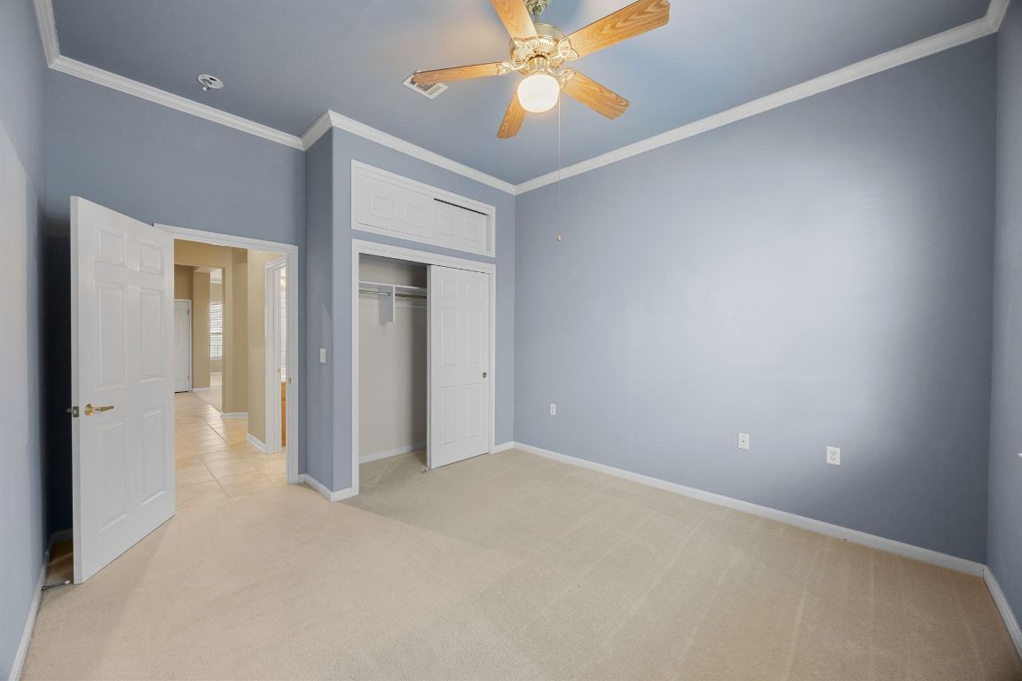 104 Lariat Drive Georgetown, TX 78633 - Photo 21 of 35 bright secondary bedroom with nice sized closet