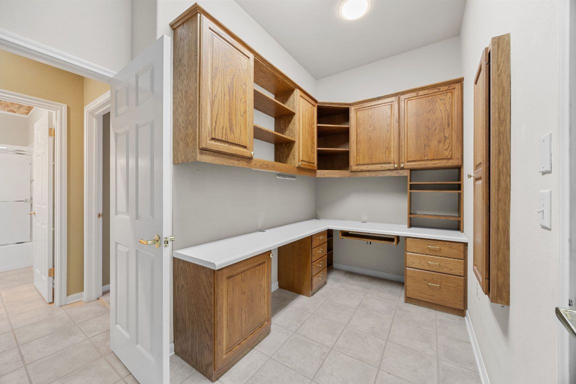 104 Lariat Drive Georgetown, TX 78633 - Photo 24 of 35 also a desk setup in the laundry room