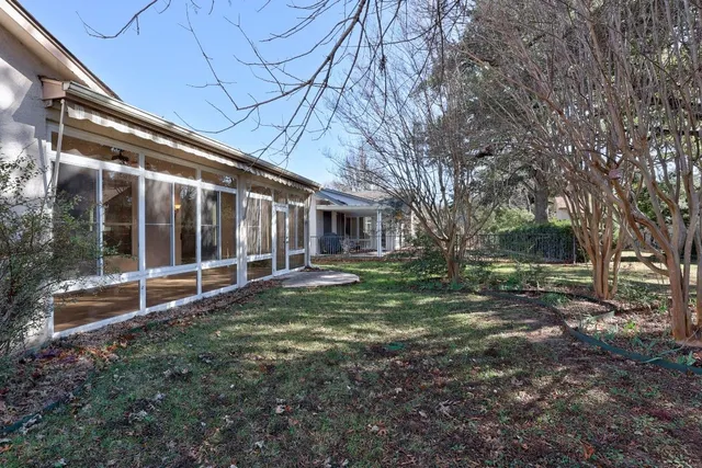 a view of backyard with green space