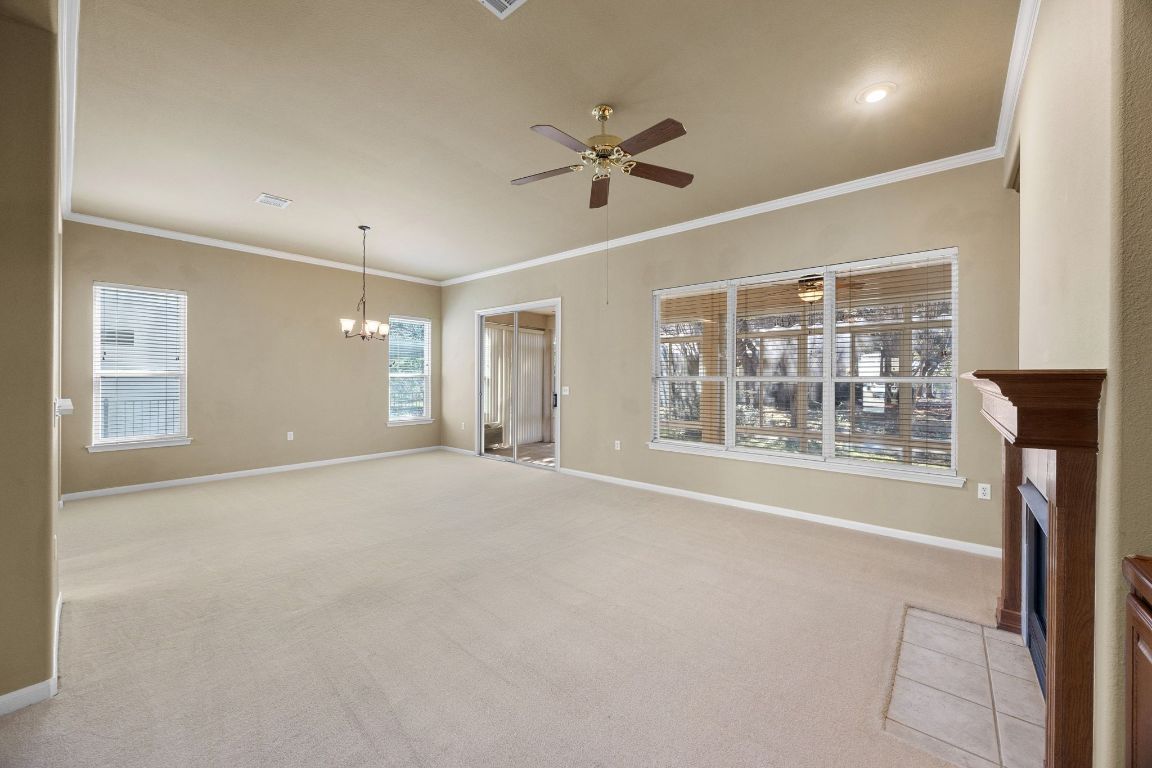 104 Lariat Drive Georgetown, TX 78633 - Photo 4 of 35 opens to a generous sized great room and dining area