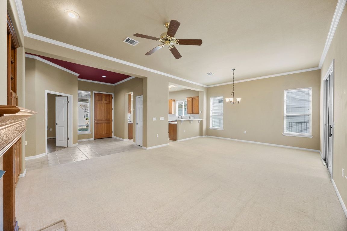 104 Lariat Drive Georgetown, TX 78633 - Photo 6 of 35 spacious living area and dining area with lots of natural light
