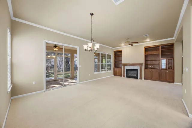 a kitchen with a stove a sink and a refrigerator