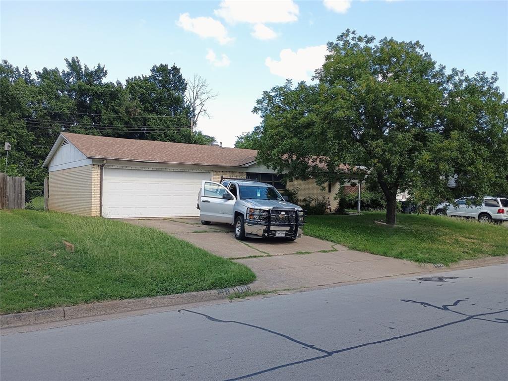 601 Martha Street Euless, TX 76040 - Photo 1 of 1 a view of a parked car in front of house
