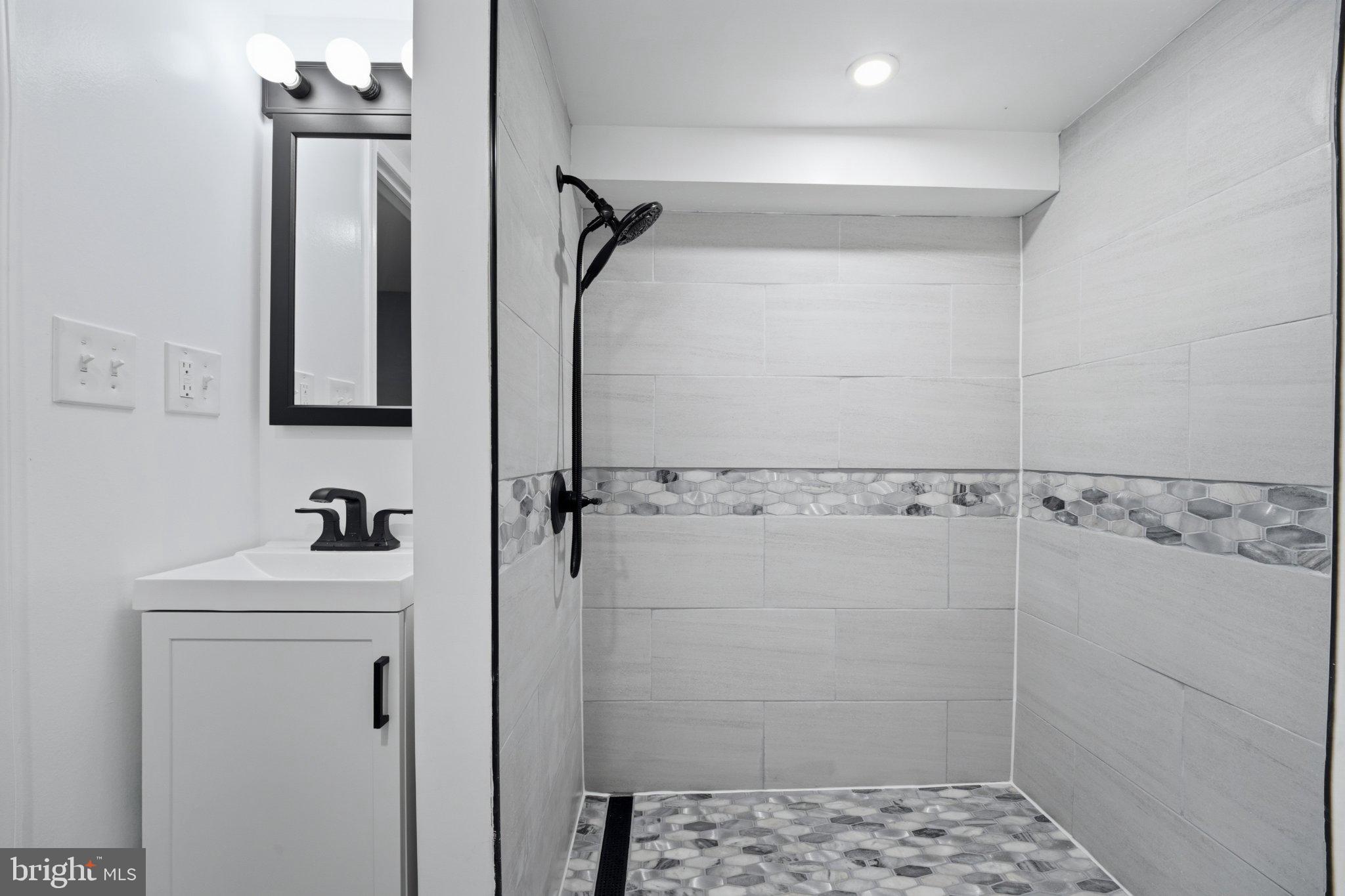 914 5th Street Northeast Washington, DC 20002 - Photo 14 of 36 Sleek modern bathroom retreat.