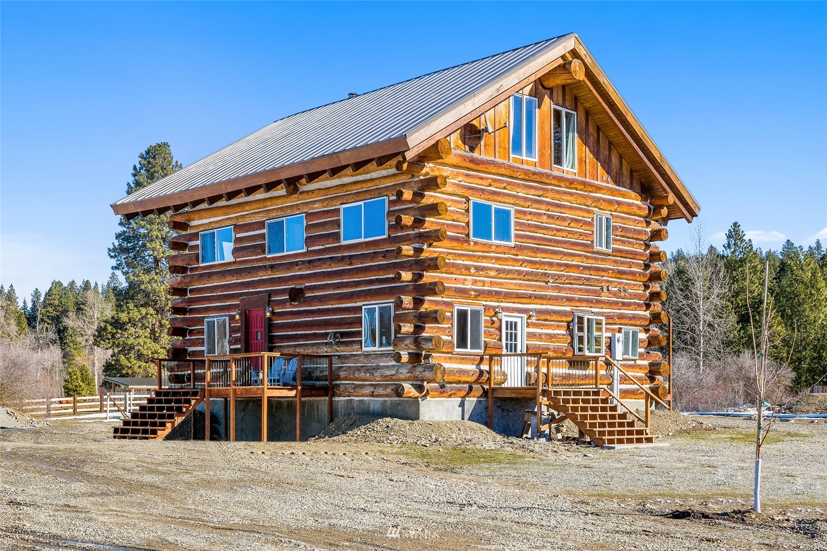 170 Quail Valley Road Cle Elum, WA 98922 - Photo 2 of 40 a view of a house with wooden stairs