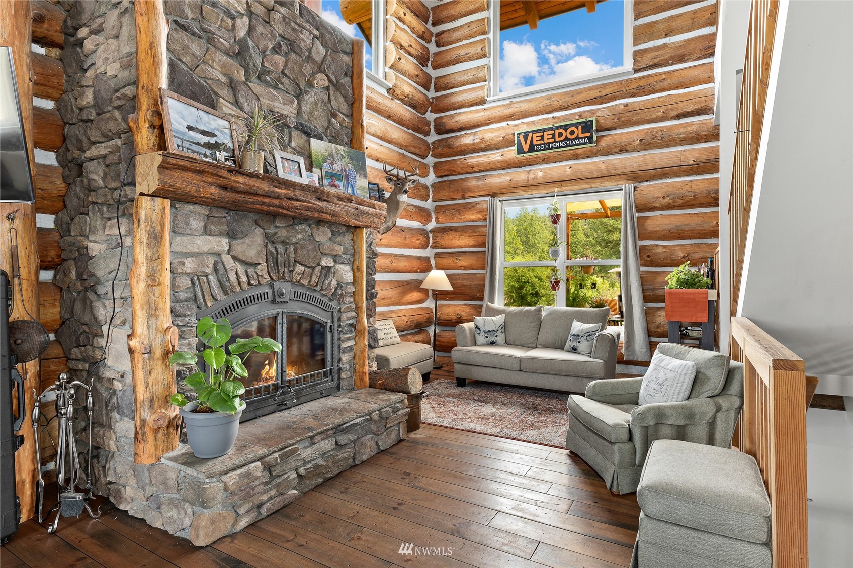170 Quail Valley Road Cle Elum, WA 98922 - Photo 6 of 40 a living room with furniture and a fireplace