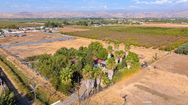 a view of an ocean and a mountain