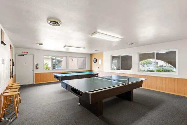 a kitchen with counter top space and stainless steel appliances