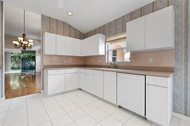 a view of a hallway with windows