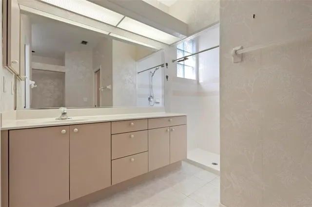 a view of an empty room with empty shelves