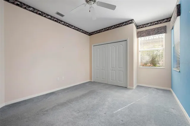 a bathroom with a sink a large mirror and a bathtub