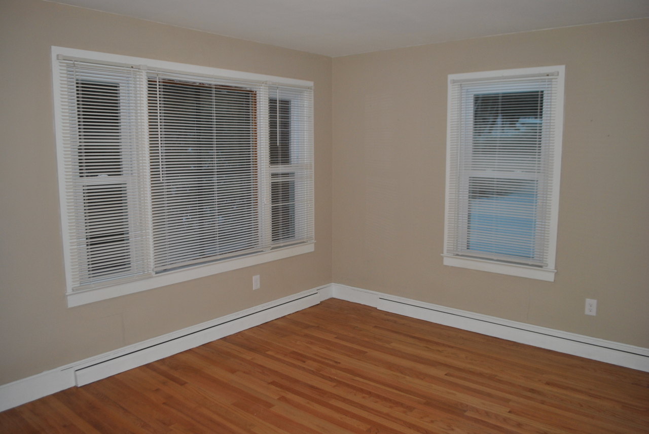 882 Savoy Road Cheshire, MA 01225 - Photo 22 of 27 a view of an empty room with wooden floor and a window
