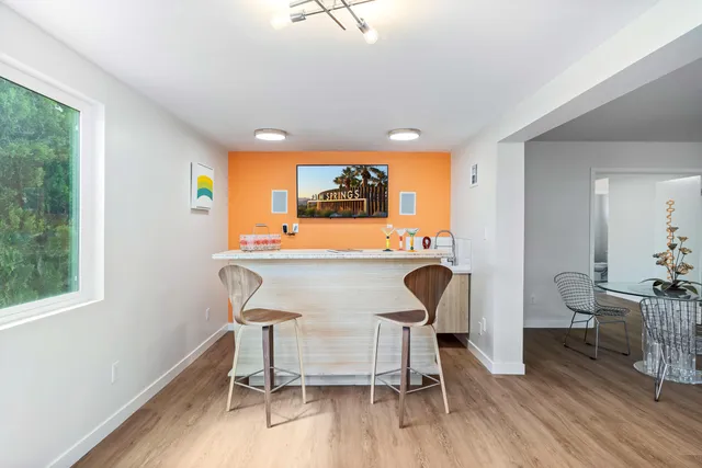 a view of a kitchen with sink and cabinet