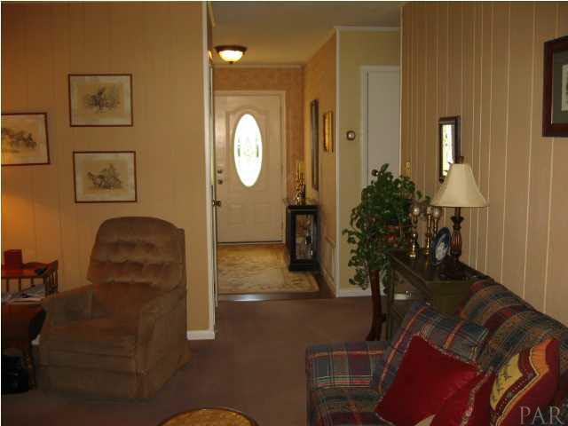 FOYER OPENS TO GREAT ROOM AND DEN