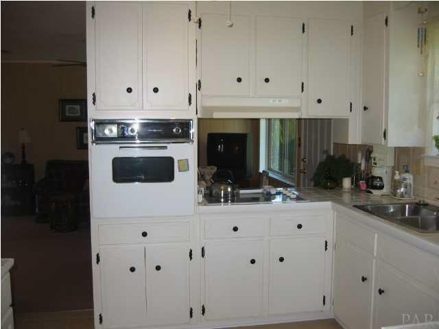 910 Commonwealth Road Pensacola, FL 32504 - Photo 10 of 23 KITCHEN OPENS TO DEN