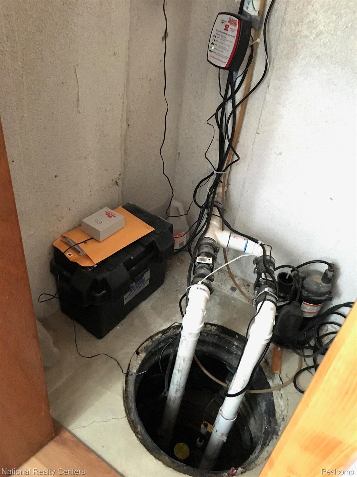 460 Coldiron Drive Rochester, MI 48307 - Photo 31 of 44 Battery back up sump pump