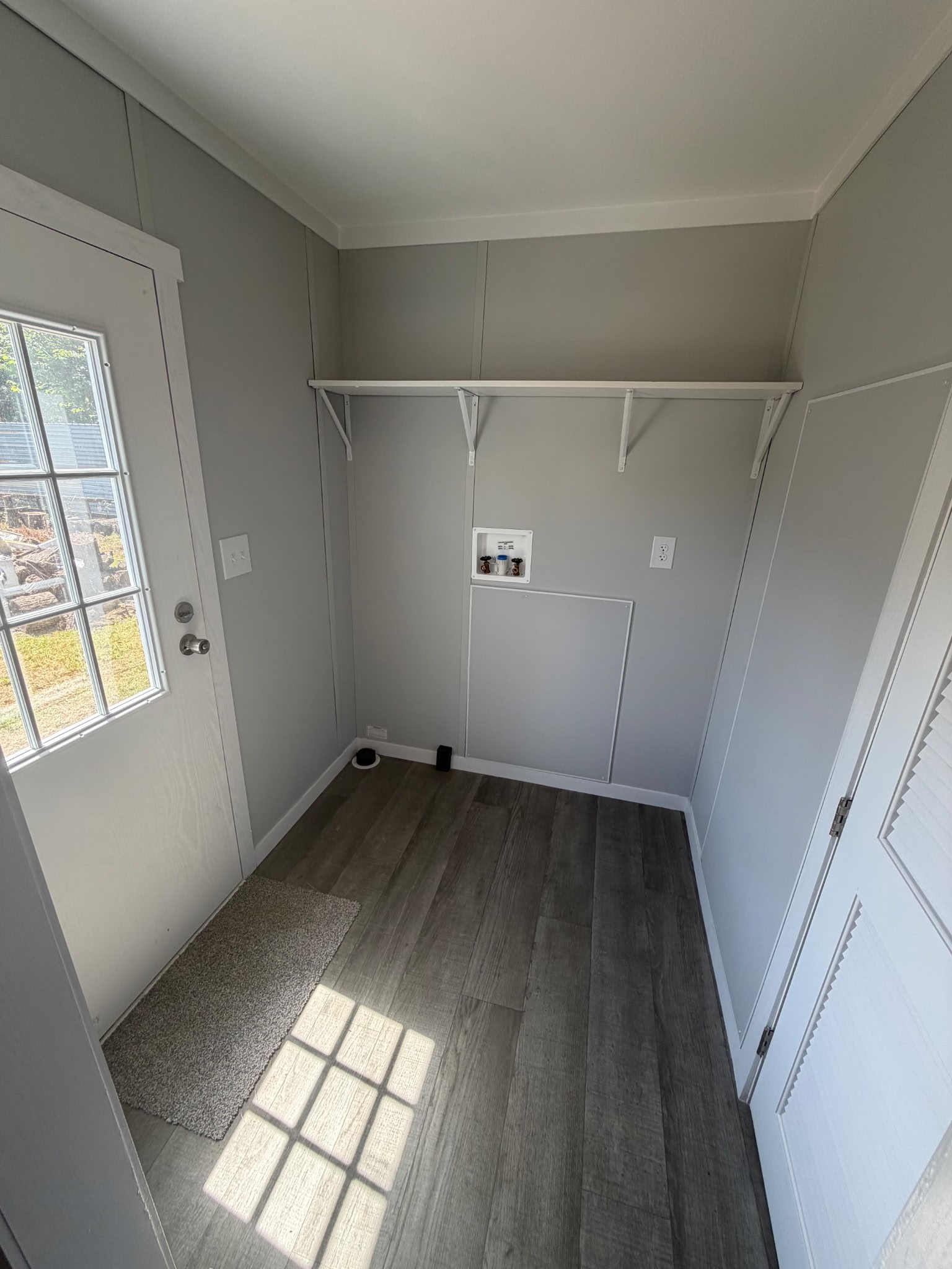 15955 Westgate Road Splendora, TX 77372 - Photo 8 of 14 wooden floor in an empty room with a window