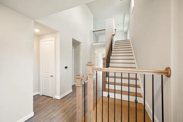 a view of entryway with wooden floor